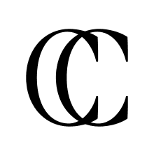 Jeremiah Brent's New York home office with custom cabinets, open shelves, and drawers for fabrics by California Closets